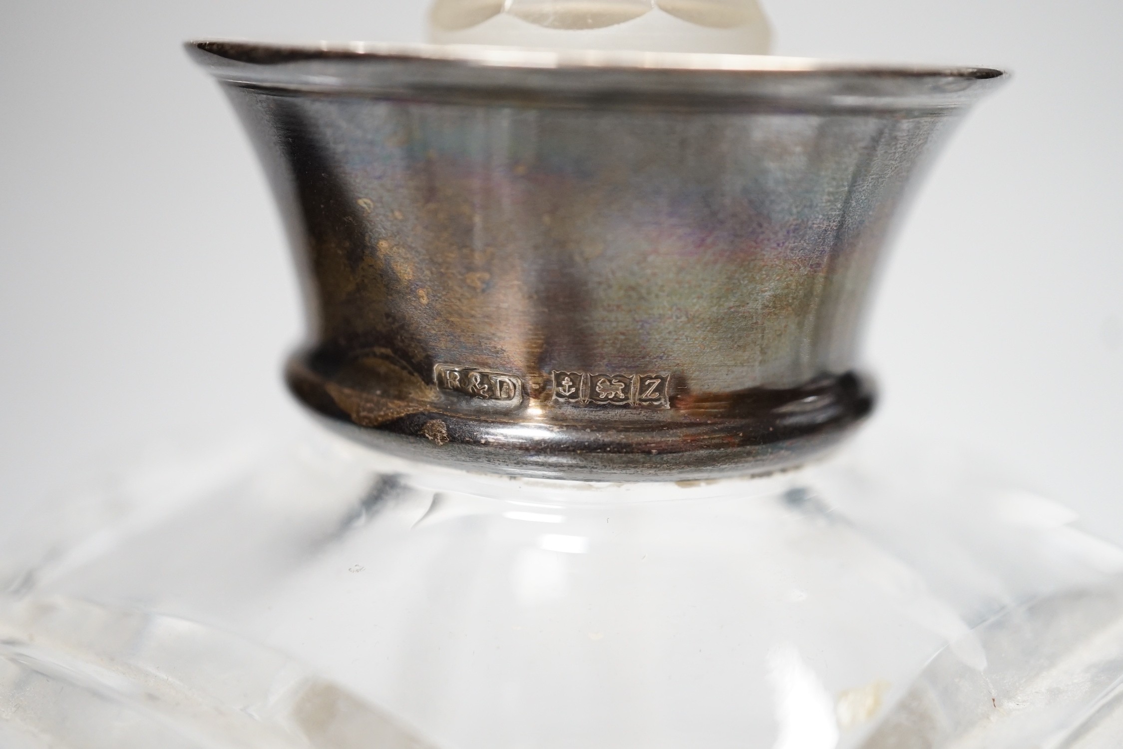 A pair of 20th century silver collared glass decanters and stoppers by Roberts & Dore Ltd, 24cm